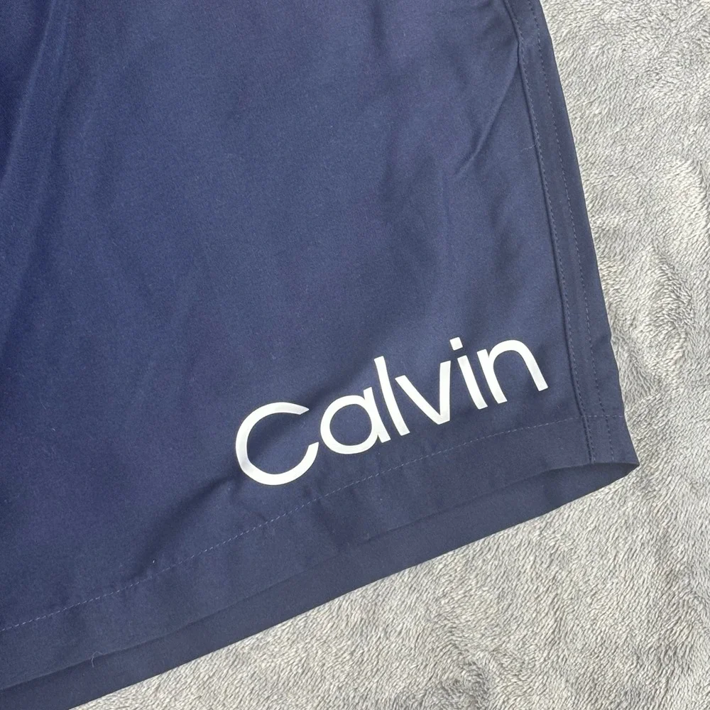 Calvin Klein Swim Trunks Men XXL Navy Blue Logo Graphic UPF 40+ CB3DP009 NWT